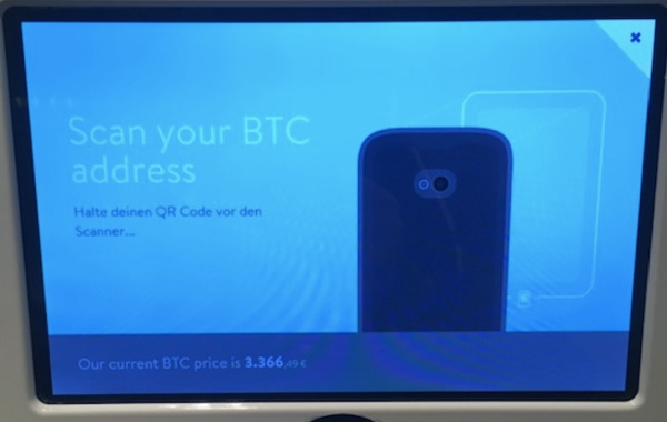 Screen your BTC address screen on a bitcoin ATM.