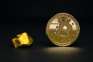As Gold Tests New Highs, Bitcoin Corrects