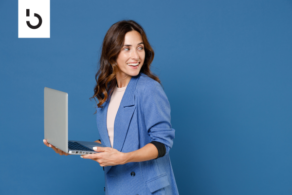 woman holding a laptop