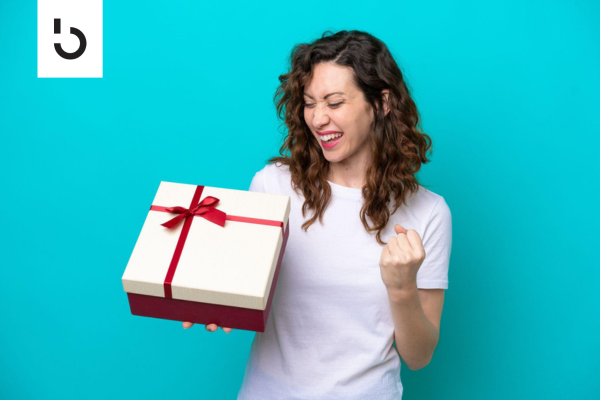 happy woman holding a gift