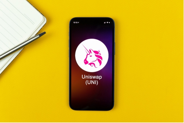 uniswap logo on a mobile phone screen